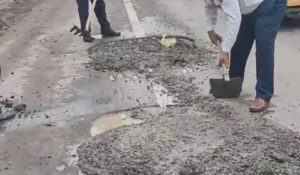 Traffic police fill potholes on roads, responsible officers sleeping