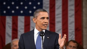 Obama criticises Trump policy at presidential center opening ceremony