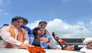 Vinesh Phogat returns to India, gets grand welcome at IGI airport