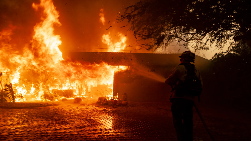 Fast-moving wildfire in California forces thousands to flee