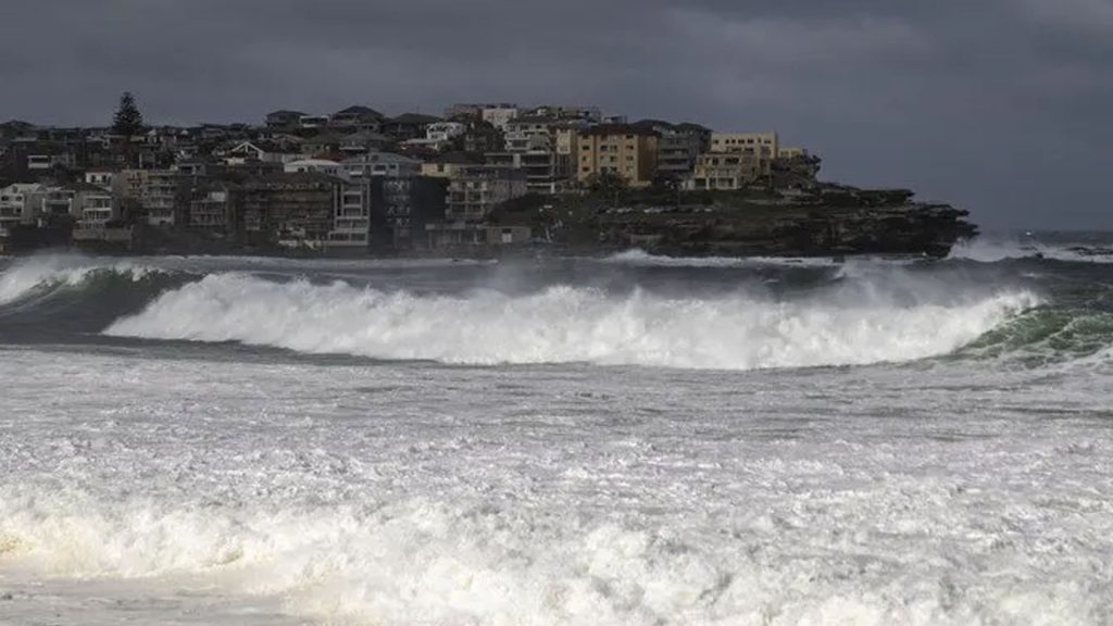 Storm hits Australia, causing property damage, flights cancellation