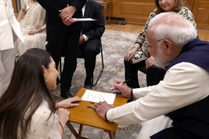 Karisma Kapoor gets PM Modi’s autograph for her children