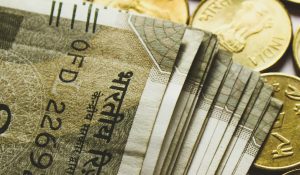 Rupee hits fresh record low against USD, may drop to 87 by March end: Experts