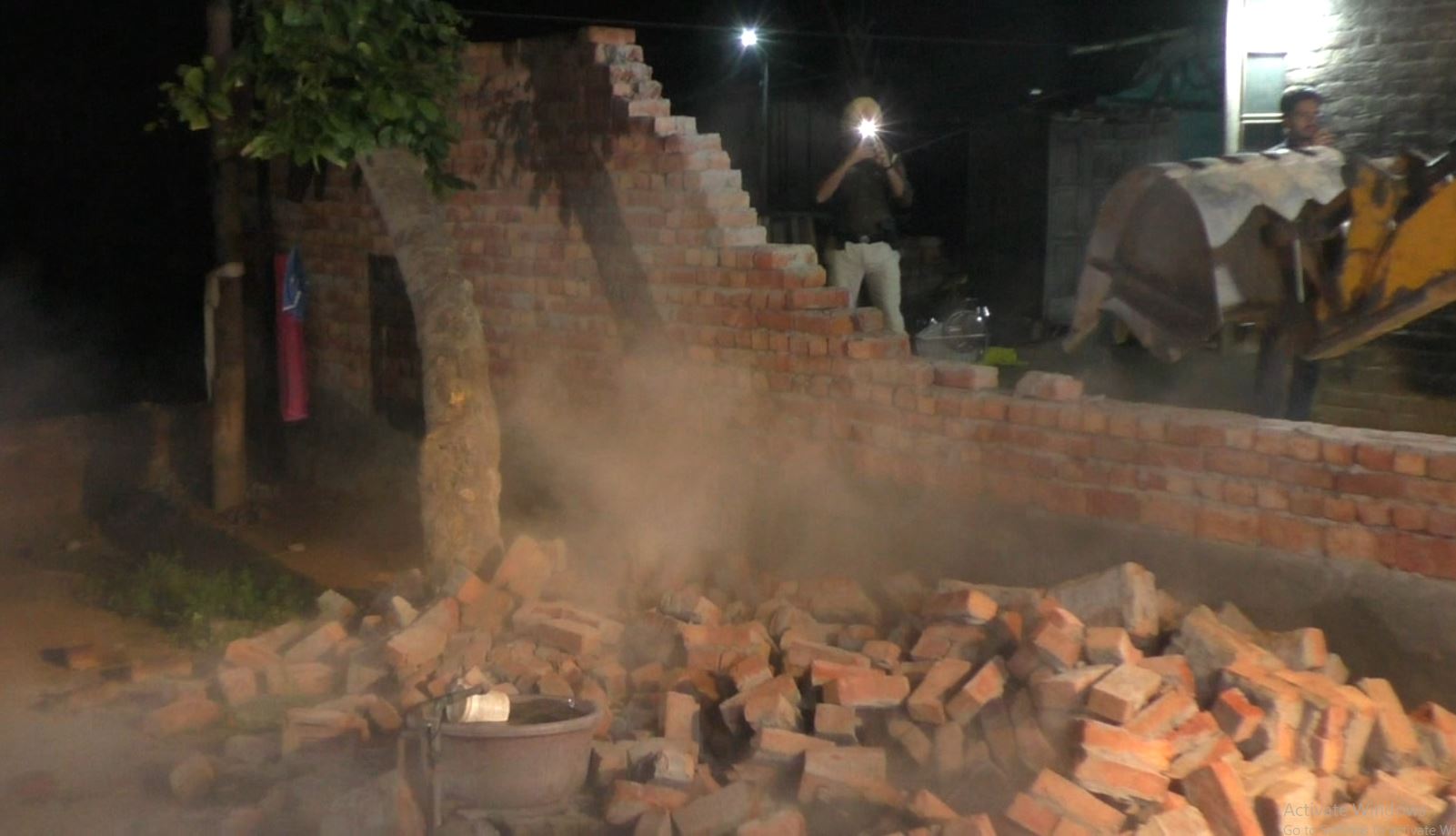 Police demolish house of Woman caught admitting to drug trade in viral video