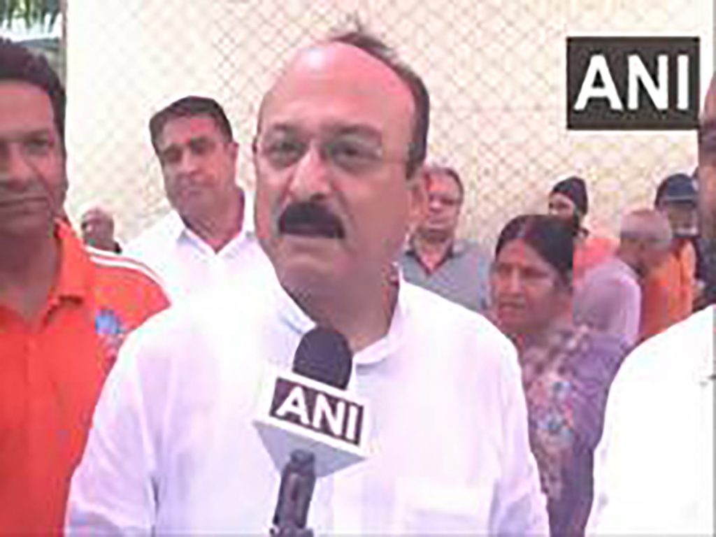 Delhi Minister Ashish Sood distributes Ayushman Bharat cards to elderly in West Delhi