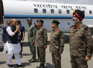 Defence Minister Rajnath Singh interacts with IAF jawans at Srinagar air base