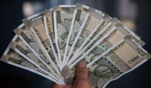 Indian rupee opens stronger against US dollar