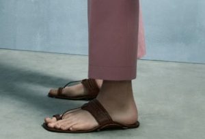 Italian fashion house Prada’s team in Kolhapur, interacts with Chappal makers