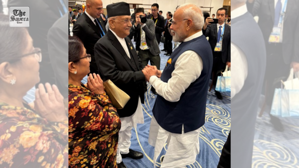 PM Modi meets Nepal's counterpart Oli, calls ties 'deep-rooted, special'