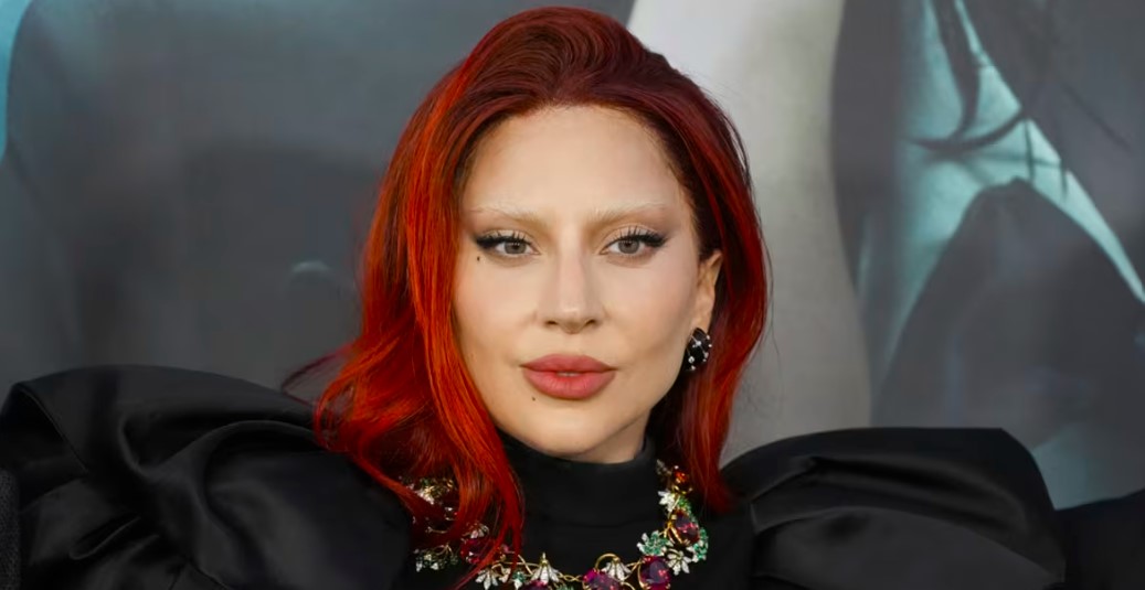 Lady Gaga hits pause on Sydney concert as dancer slips off stage