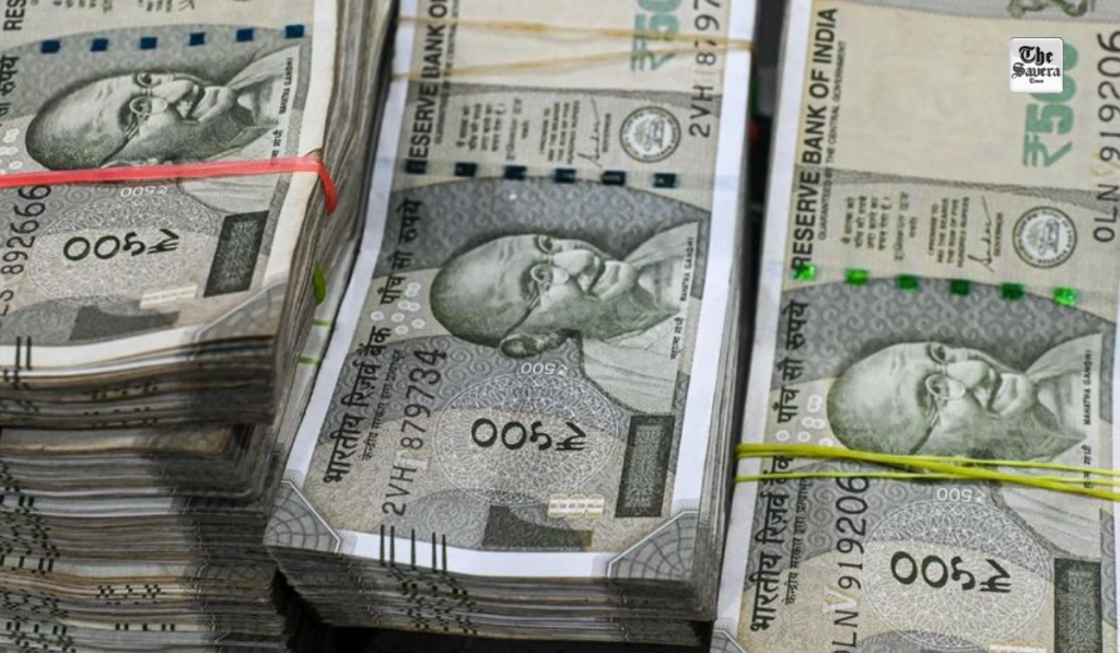 Rupee hits record low, slips 25 paise to close at 90.74 against US dollar