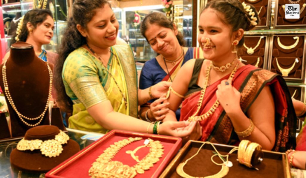Gold prices jump over 4 pc to hit record high