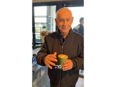 Israeli PM Netanyahu debunks death rumours, sips coffee, shows 5 fingers
