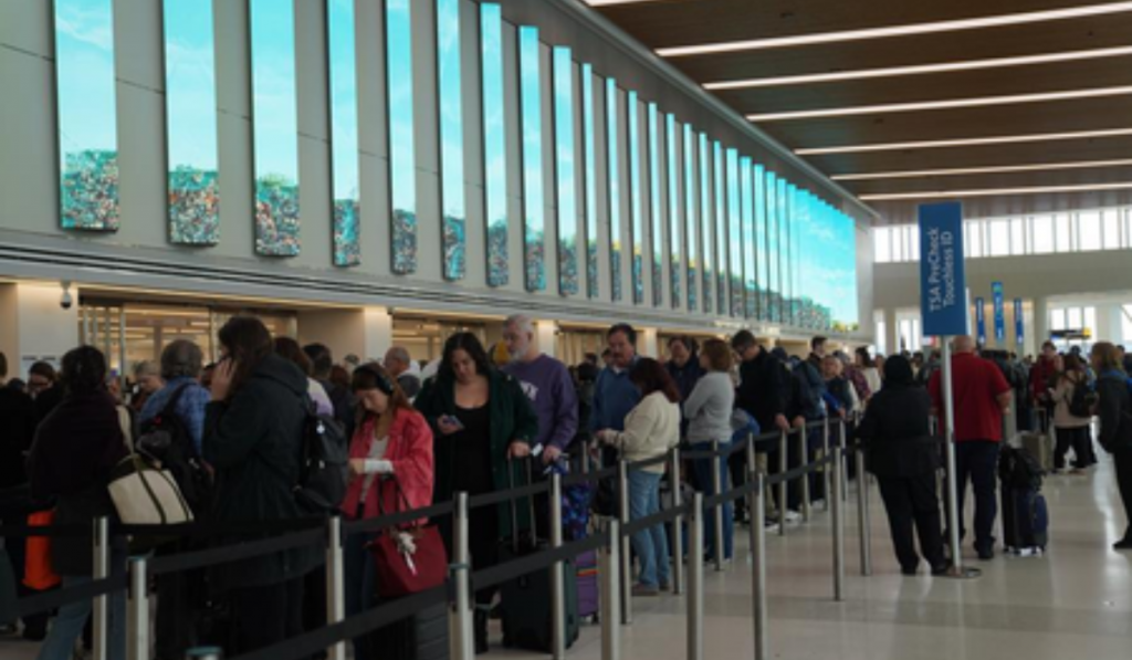 US Airport Delays Mount Amid DHS Shutdown; Trump Deploys ICE Agents