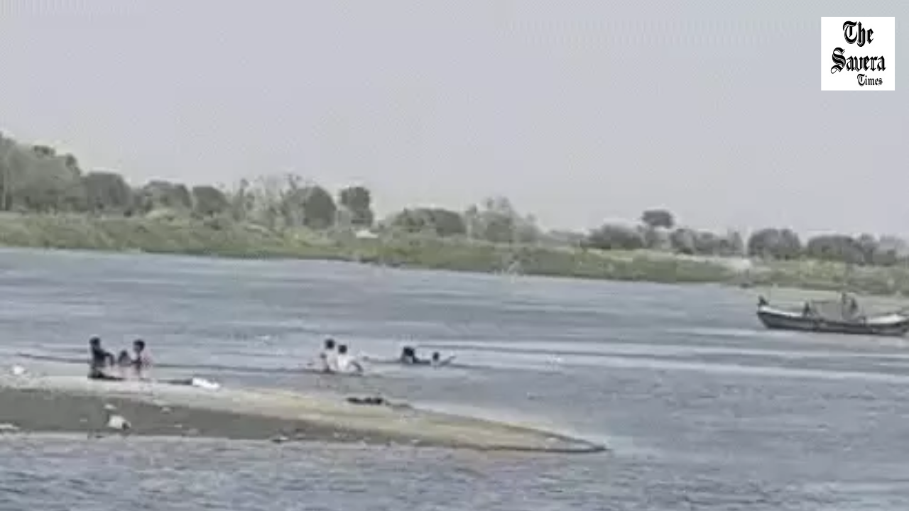 This footage is from after the accident. Devotees are seen drowning in the river and coming out by swimming.