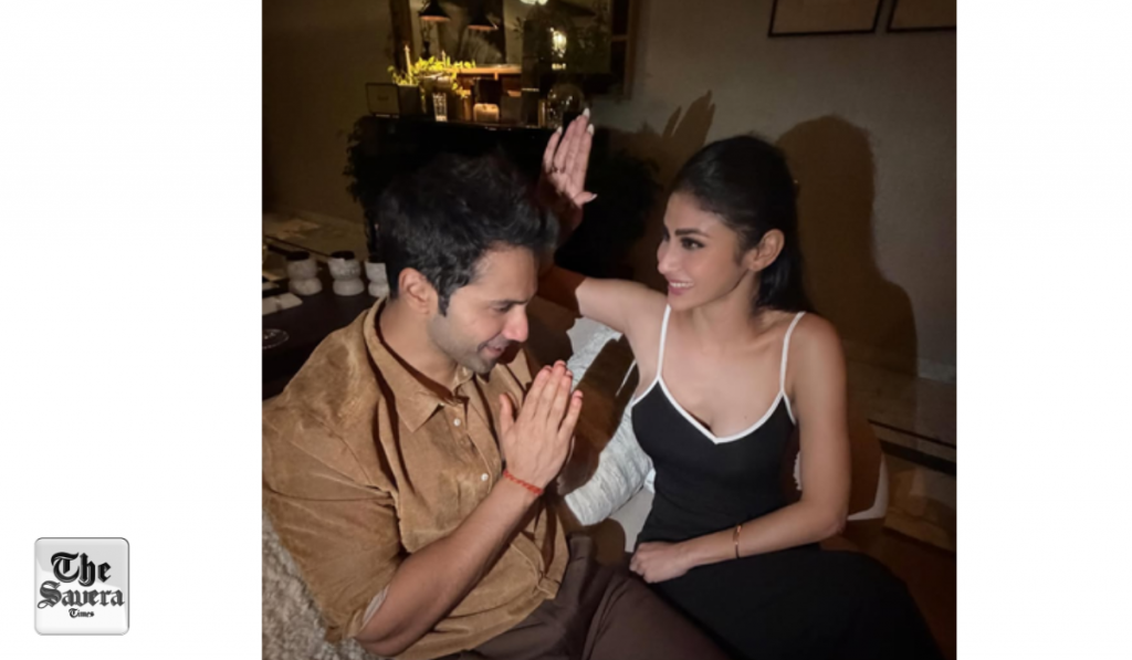 Varun Dhawan takes blessing from his on screen 'Maa' Mouni Roy