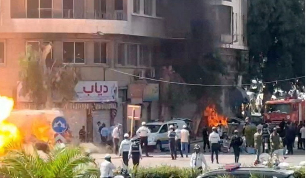 Explosions heard near Syrian hotel where French PM was to stay