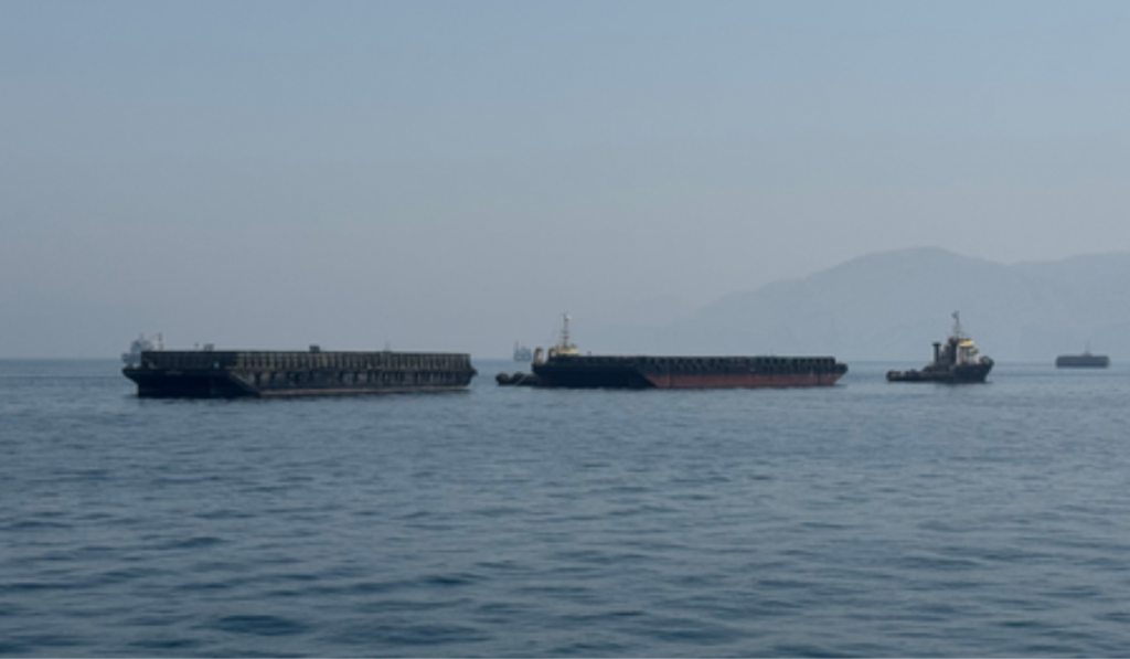 Iran, Oman Discuss Temporary Shipping Corridor Through Hormuz Strait