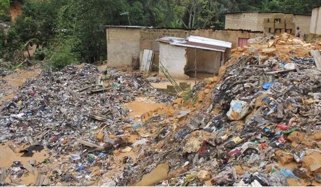 Part of a large garbage dumping site collapsed in Guinea's capital, Conakry, following heavy rain.
