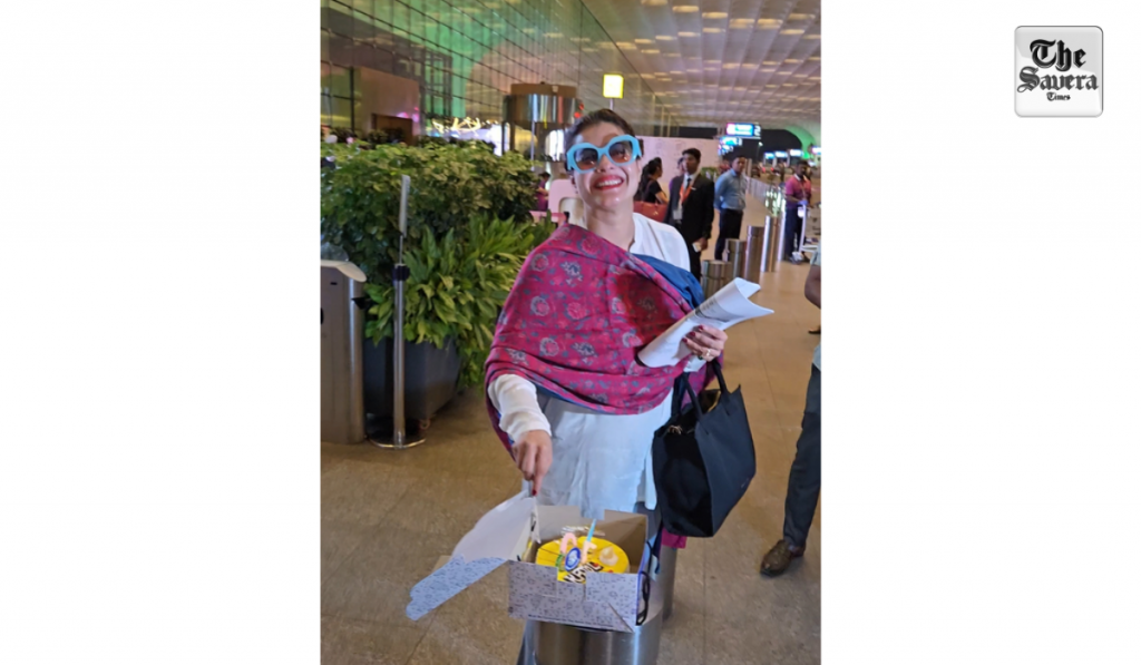 Kajol cuts birthday cake with paps at airport, shy Nysa Devgn stays out of frame