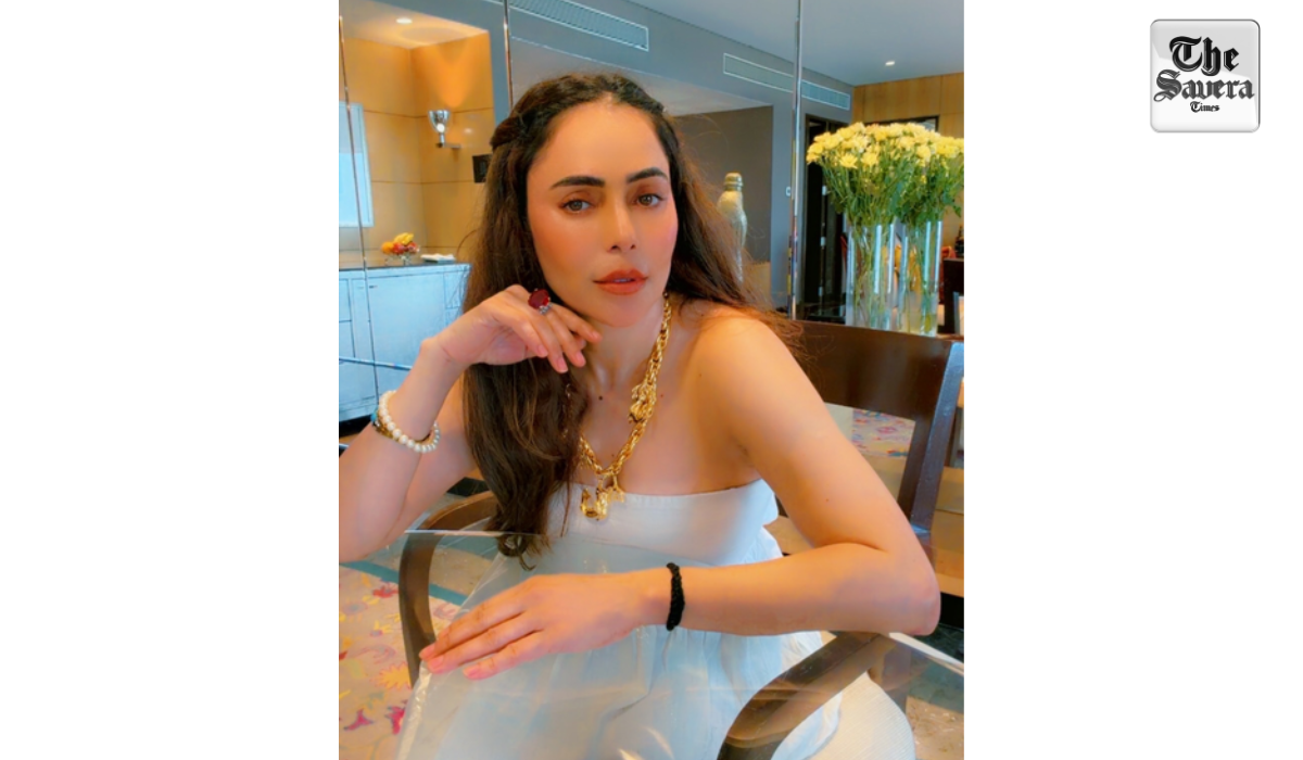 Nikita Rawal gets kissed on the lips by a female fan