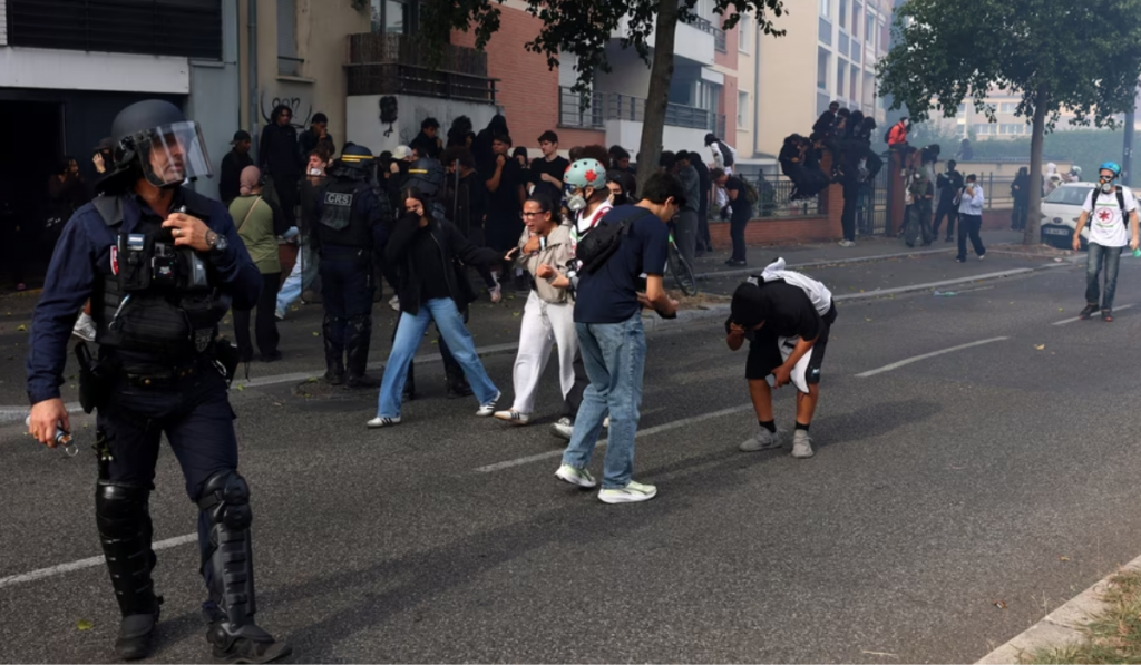 Paris Student Protests Escalate as Cars Set Ablaze, Police Use Tear Gas